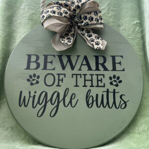 BEWARE OF THE WIGGLE BUTTS SIGN