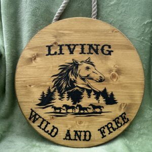 LIVING WILD AND FREE SIGN